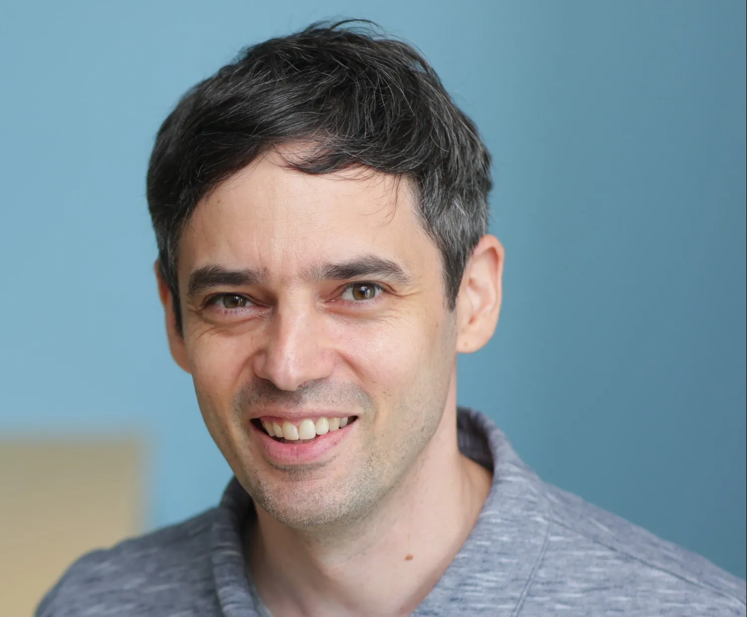 Aaron Moment By John Abbott Cropped Headshot.jpg
